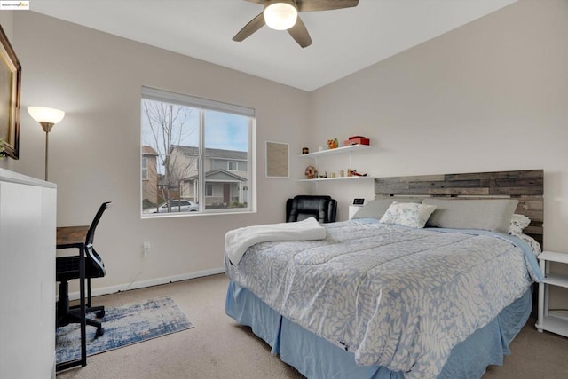 bedroom with light colored carpet and ceiling fan