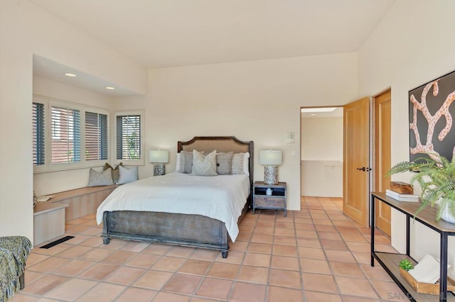 bedroom with light tile patterned flooring