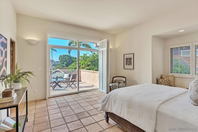 tiled bedroom with access to outside