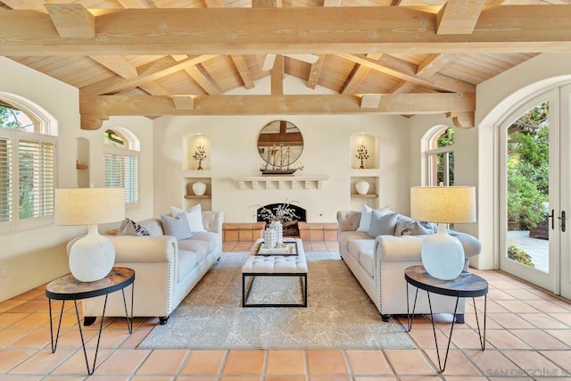 interior space with built in features, vaulted ceiling with beams, wooden ceiling, and french doors