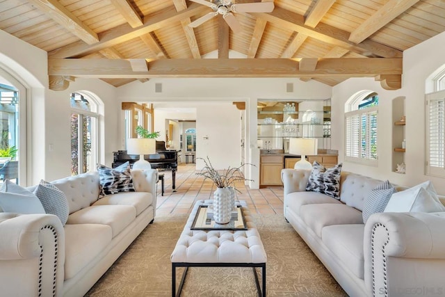 living room with light tile patterned floors, wood ceiling, lofted ceiling with beams, and ceiling fan