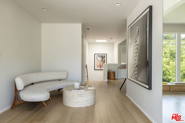 living area featuring light hardwood / wood-style flooring