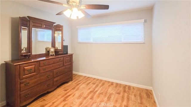 bedroom featuring light hardwood / wood-style flooring and ceiling fan