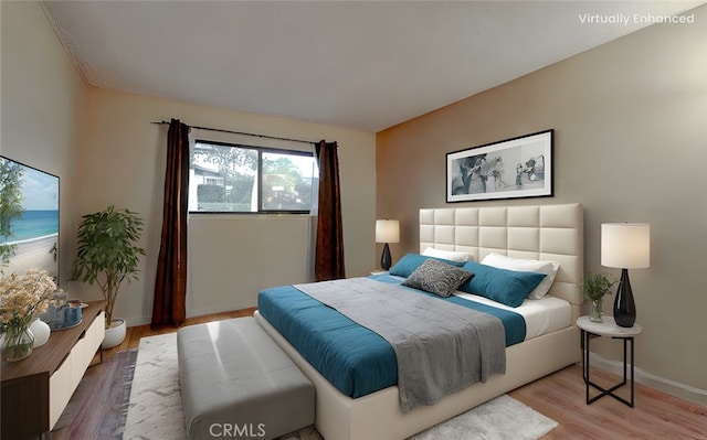 bedroom featuring wood-type flooring