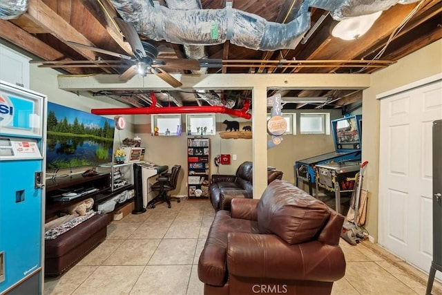 interior space with tile patterned flooring and ceiling fan