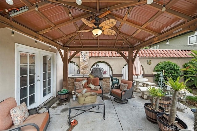 view of patio / terrace featuring a gazebo and french doors