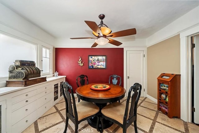 dining area with ceiling fan