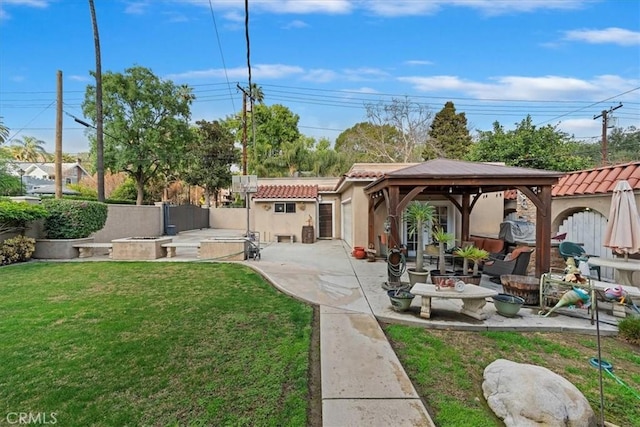 view of yard with a gazebo and a patio