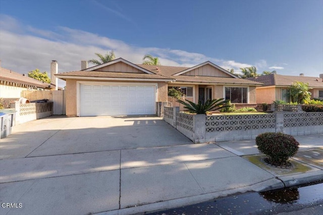 single story home featuring a garage