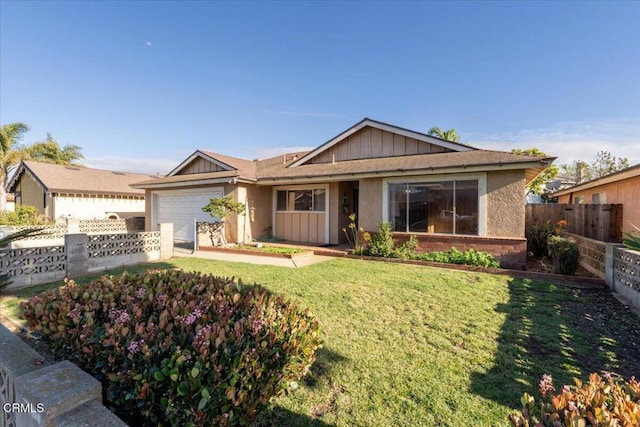 single story home with a garage and a front yard