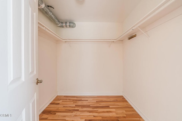 spacious closet with light wood-type flooring