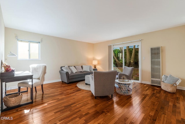 3233 Playa Ct, Oxnard, CA 93035 - living room featuring a heating unit and hardwood / wood-style flooring