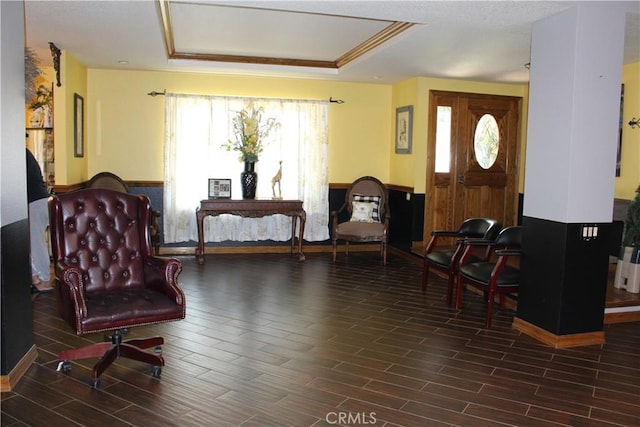 sitting room featuring a tray ceiling