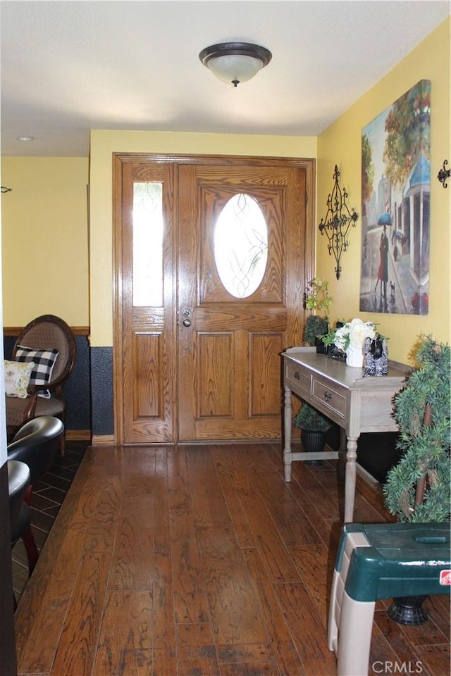 foyer entrance with dark hardwood / wood-style flooring