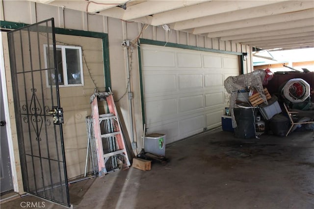 garage featuring a carport