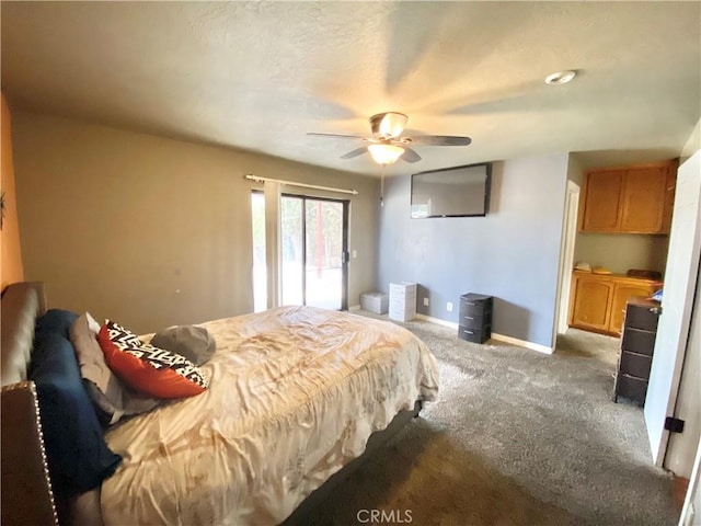 bedroom featuring ceiling fan and carpet flooring