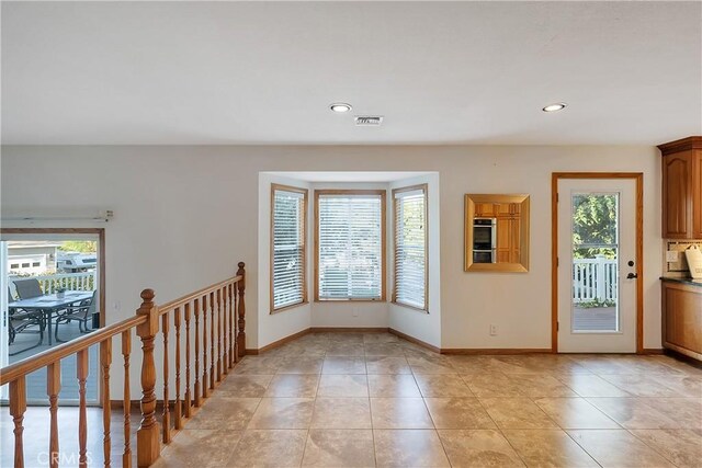 31750 1st St, Acton, CA 93510 - entryway featuring recessed lighting, a healthy amount of sunlight, baseboards, and light tile patterned floors