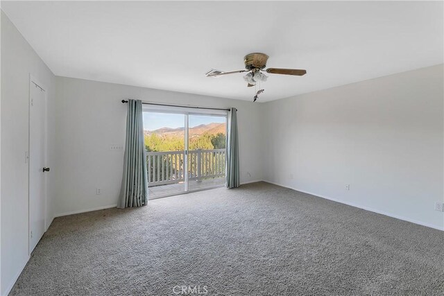 31750 1st St, Acton, CA 93510 - unfurnished room with carpet floors, a ceiling fan, visible vents, and baseboards