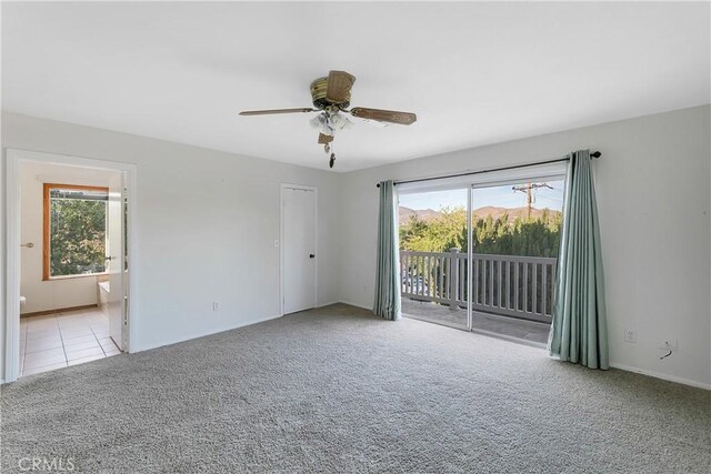 31750 1st St, Acton, CA 93510 - carpeted empty room with plenty of natural light, a ceiling fan, and baseboards