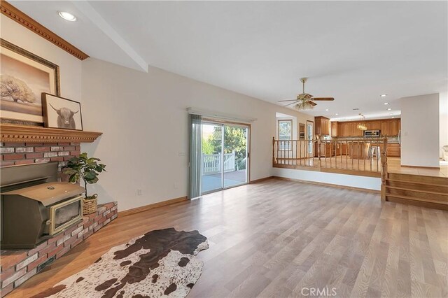 31750 1st St, Acton, CA 93510 - living area with light wood finished floors, baseboards, recessed lighting, and ceiling fan