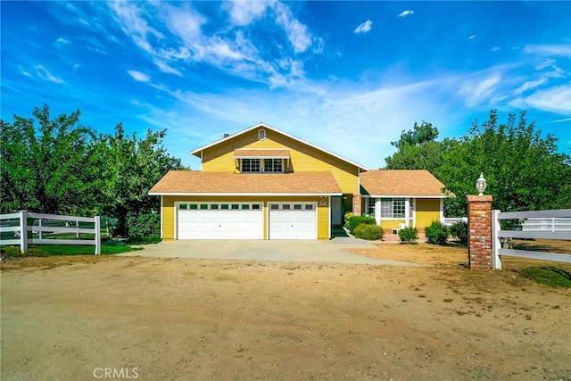 view of front of home with a garage