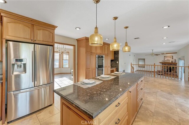 31750 1st St, Acton, CA 93510 - kitchen with ceiling fan, appliances with stainless steel finishes, a center island, and recessed lighting