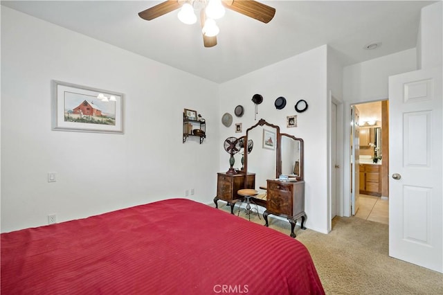 bedroom with light carpet and ceiling fan