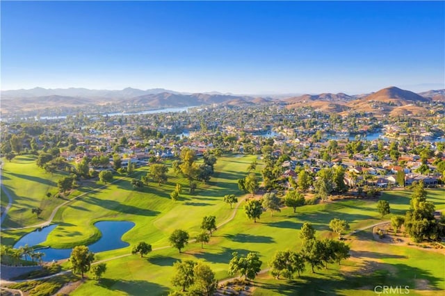 aerial view featuring a water and mountain view