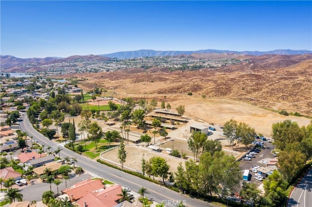 birds eye view of property with a mountain view