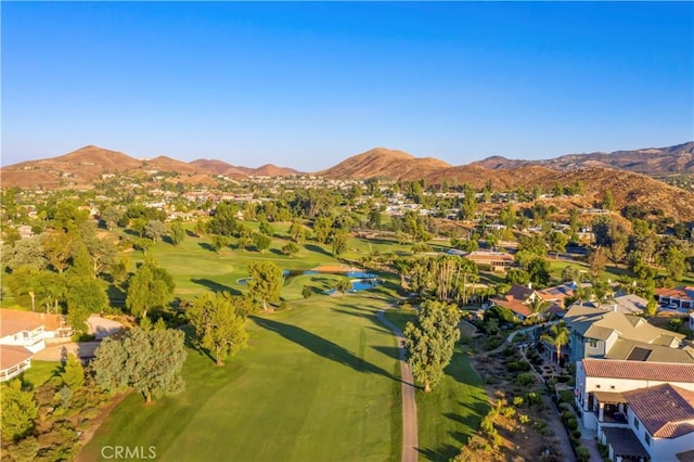 birds eye view of property featuring a mountain view