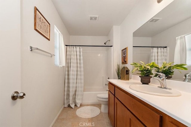 full bathroom with vanity, shower / tub combo, tile patterned floors, and toilet