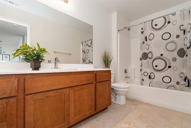 full bathroom featuring vanity, shower / bathtub combination with curtain, and toilet