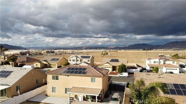 drone / aerial view featuring a mountain view