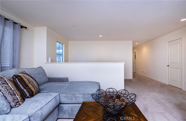 living room with light colored carpet