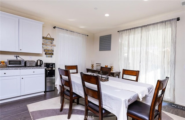 dining room featuring dark hardwood / wood-style flooring