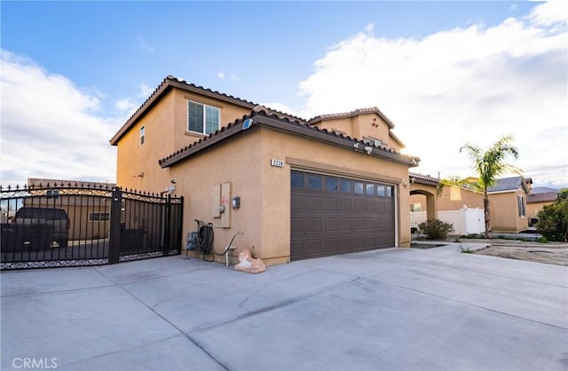 view of property exterior with a garage