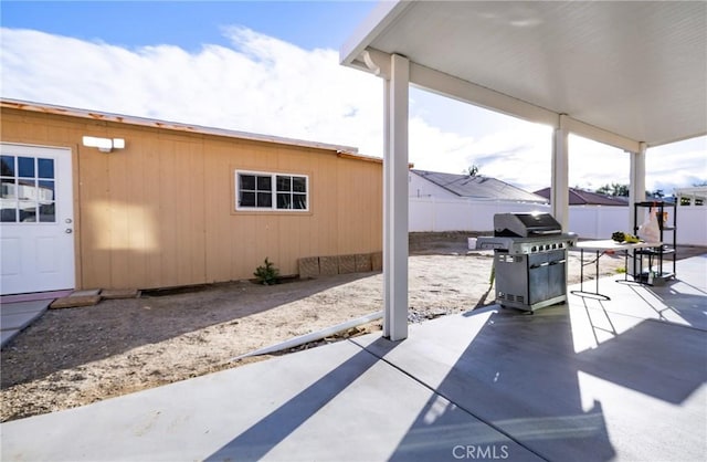 view of patio with a grill