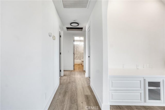 hall featuring light hardwood / wood-style floors