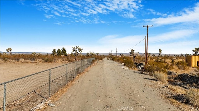 view of street featuring a rural view