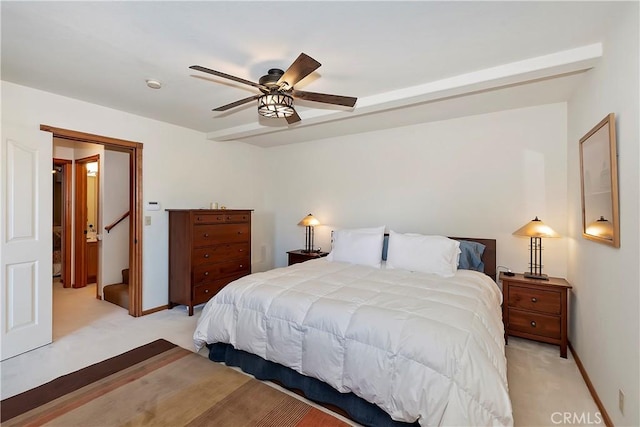 bedroom with light colored carpet and ceiling fan