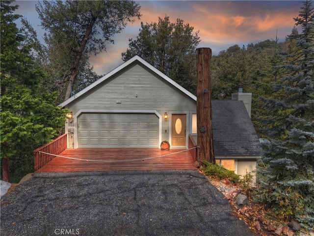 view of front of property with a garage