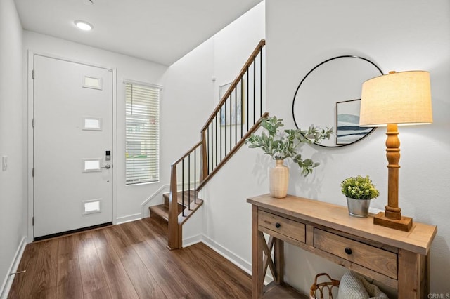 entrance foyer with dark hardwood / wood-style flooring