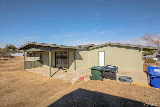 back of house featuring a patio area