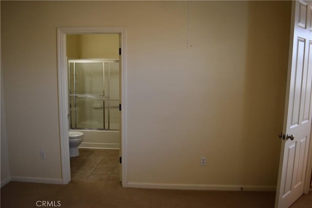 unfurnished bedroom with light tile patterned floors