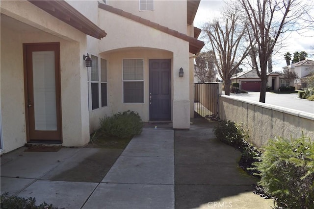 property entrance with a garage