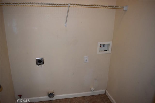 laundry area featuring gas dryer hookup, tile patterned floors, and hookup for a washing machine