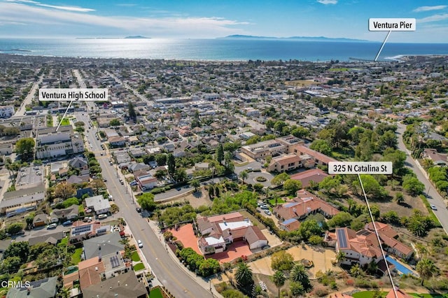 bird's eye view with a water view and a residential view