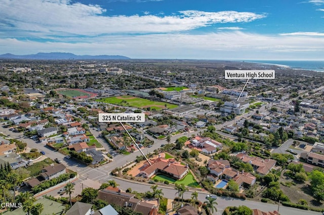 birds eye view of property with a residential view and a mountain view