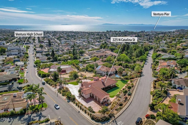 bird's eye view featuring a residential view and a water view