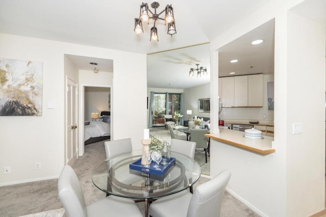 view of carpeted dining area